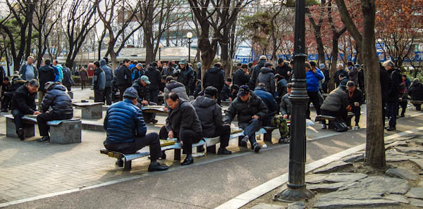 Men Playing Chess Outside The Main Gate Of Jongmyo Shrine