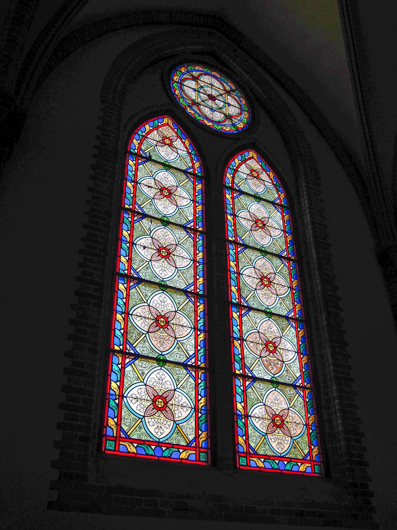 Stained glass windows inside Myeongdong Cathedral in Seoul, South Korea