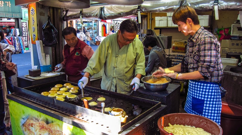 Hotteok (sweet filled snack that resembles a pancake) street vendor in Insadong, Seoul