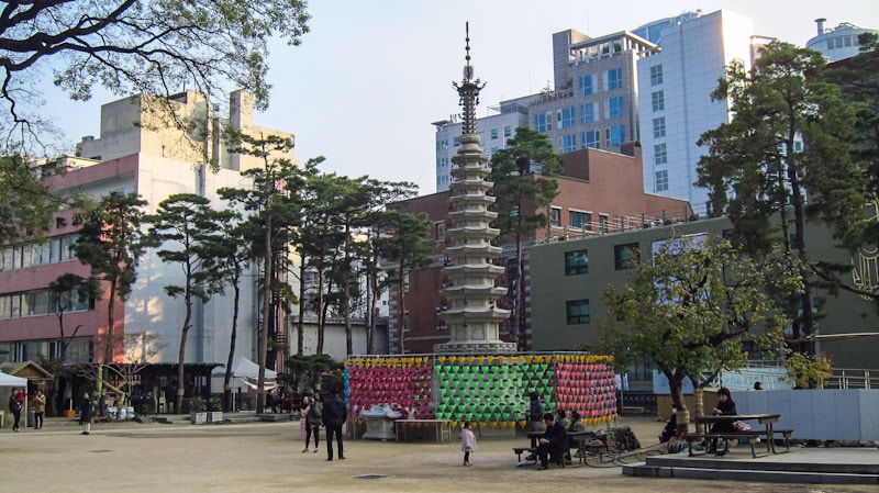 The Jogyesa Temple grounds are surrounded by urban buildings