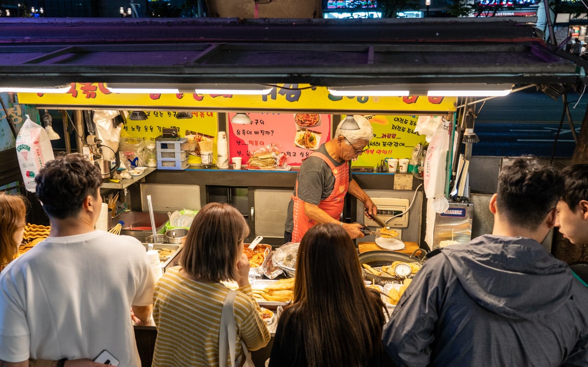 Street vendors lining the street just outside Konkuk University Station, Kondae (Konkuk University Area), Seoul, Korea