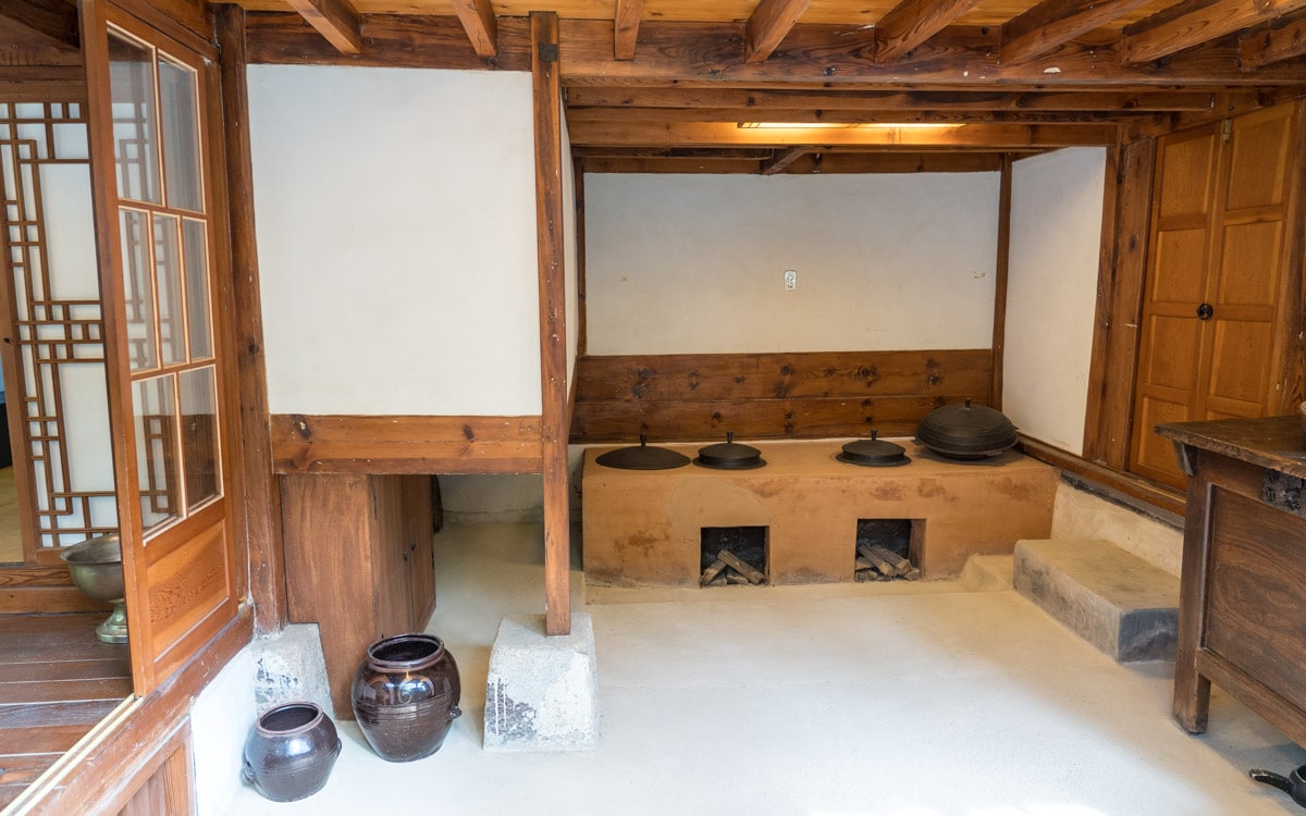 The kitchen served as a place for cooking and for heating, Baek In-je House Museum, Seoul, Korea